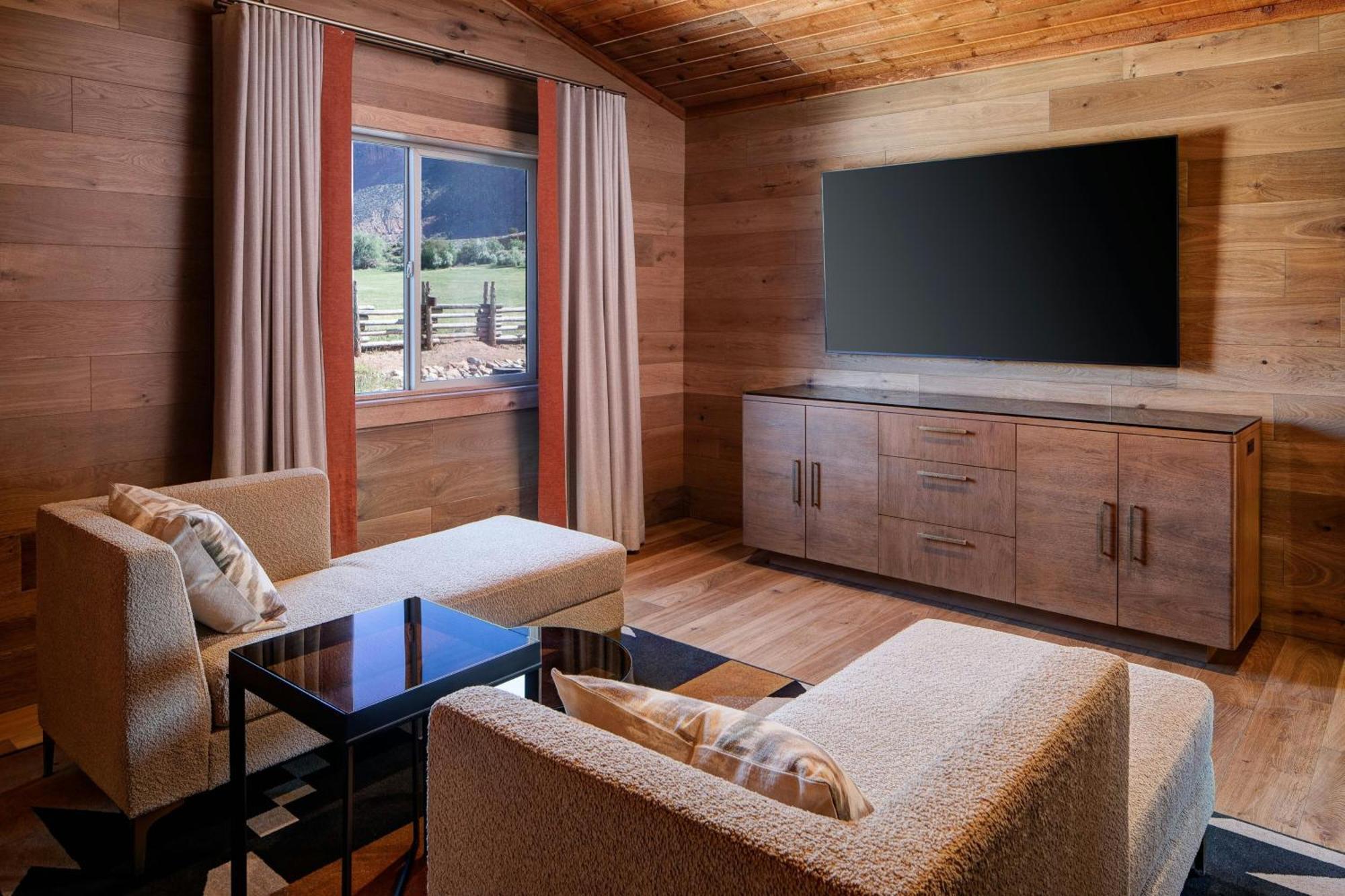 Deluxe Riverfront King Cabin Suite Sofa Bed
