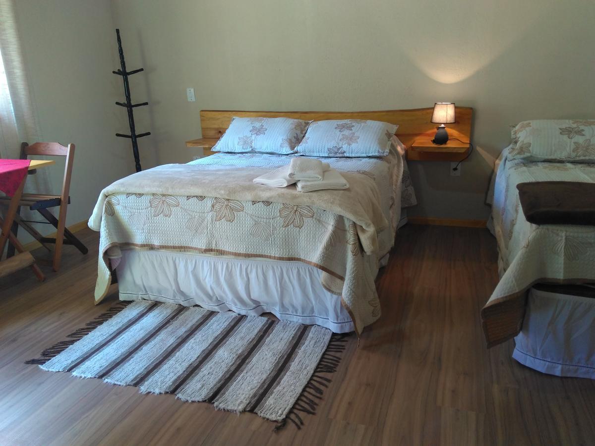Quarto Triplo com Vista do Jardim