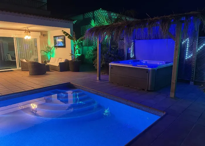 Villa Blossom In The Beautiful Area Of Puerto Santiago Tenerife With 5 Bedrooms For Up To 10 Guests Private Swimming Pool And Many Other Activities To Entertain The Family Secure Parking For 2 Cars And Disabled Access Throughout