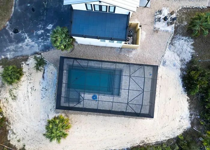 Canal- Bay Front Family Home 5-Bedroom Sleeps 18 Pool Coming Soon Boat Dock