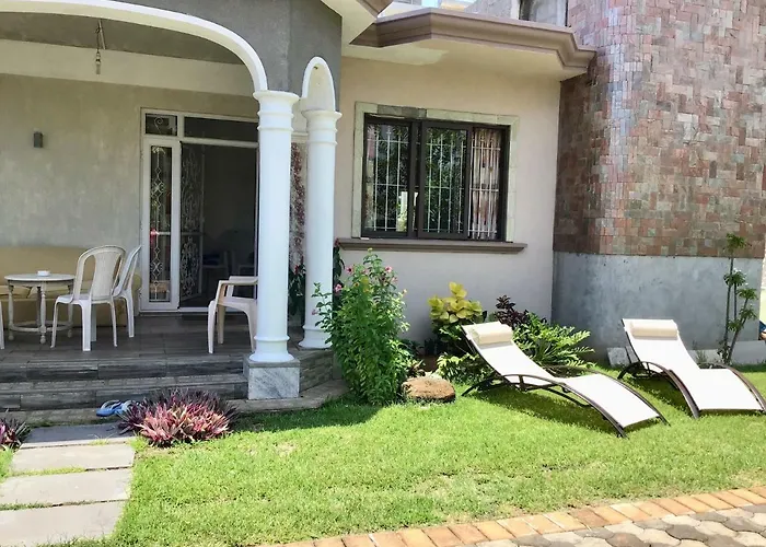 Cardamon Villa Is A 2 Bedroom With 1 Bathroom And Seperate Toilet Detached House With Ac And Swimming Pool , 5 Minutes Walk From Flic En Flac Public Beach